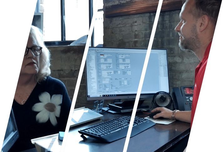 a elderly woman sitting with a loan officer 