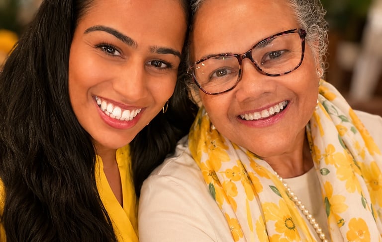 Yellow Flower Travel founders smiling together.