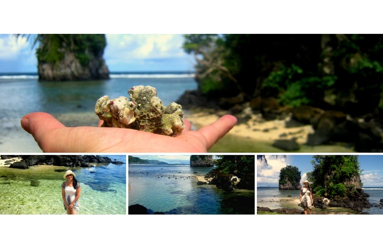 Autora visitando o Fatu-ma-Futi, com ângulo que destaca o icônico cartão-postal de Pago Pago e o mar azul ao redor.