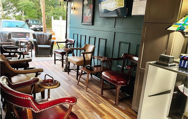 Inside view of our Cigar Haven mobile lounge showcasing our comfy chairs.