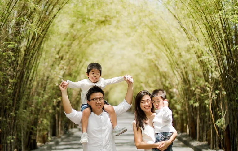 Playful family portrait during a natural family session at W Bali Seminyak