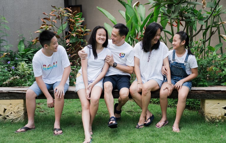 Candid family interaction during extended family photography at Lumbini Villas Jimbaran Bali with natural expressions