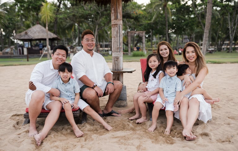 Large family portrait during a destination family photography session at The Laguna Bali