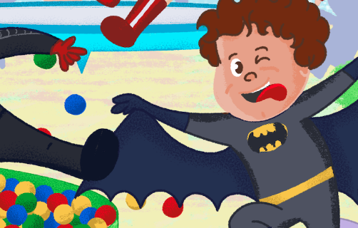 illustration of a boy wearing batman costume. He's showing his tongue and smiling
