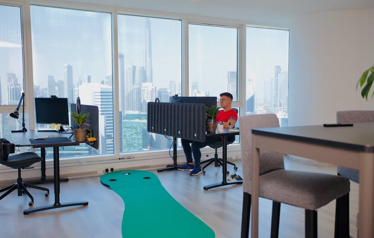 Public Relation Officer sitting the ZETUP PRO office working on client visas and company formation