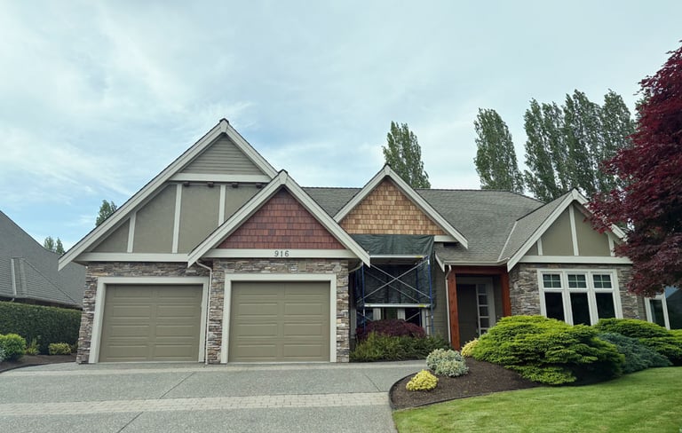 home partway through cedar shingle revitalization project in Qualicum Beach