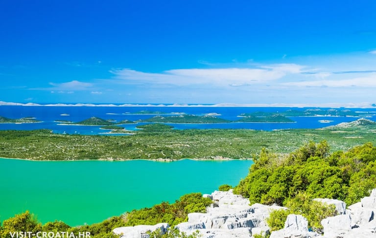 Birdwatching tower overlooking Vransko Lake surrounded by wetlands and cycling trails.