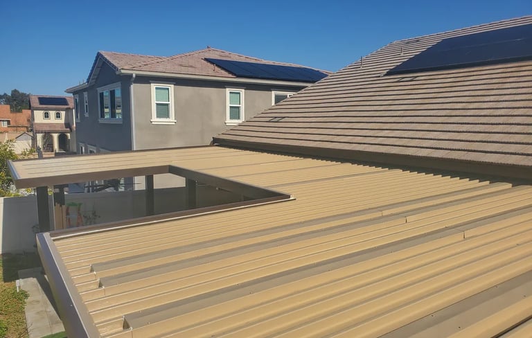 Veiw of 2 story homes and top of Alumawood patio cover.