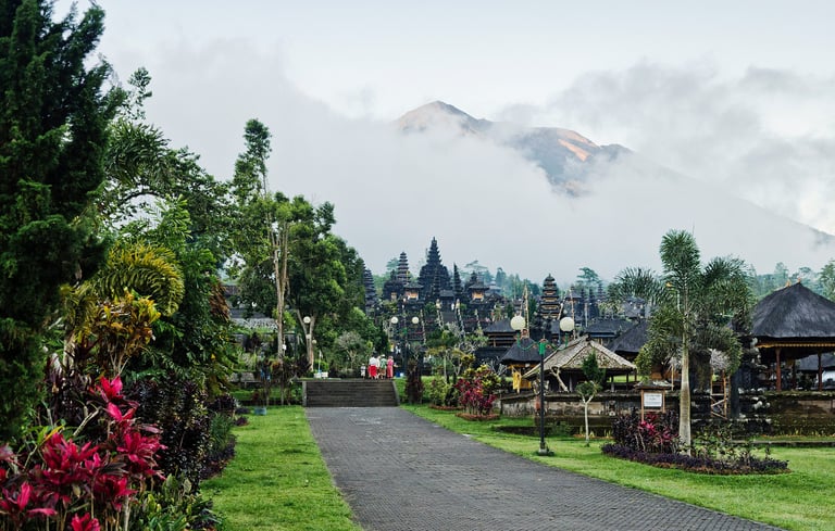 Traditional Balinese architecture at Besakih Temple surrounded by lush mountain scenery