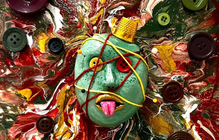 a painting of a face with buttons and buttons