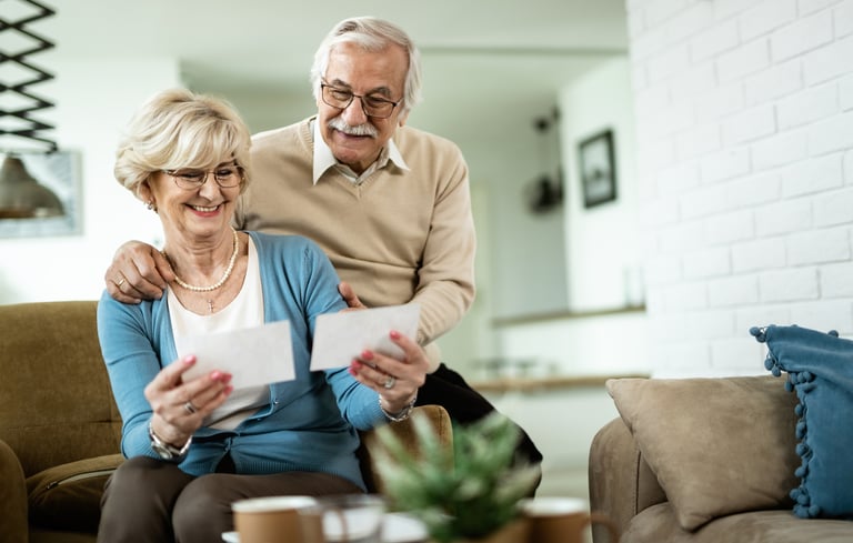 a man and woman sitting on a couch