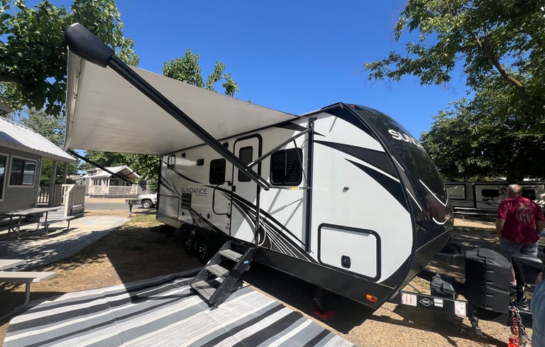 heartland sundance travel trailer at campsite