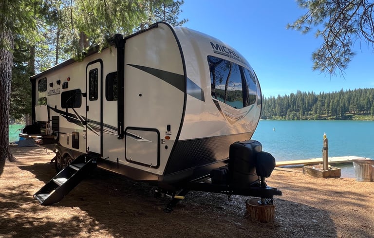 beautiful trailer in front of sly park lake