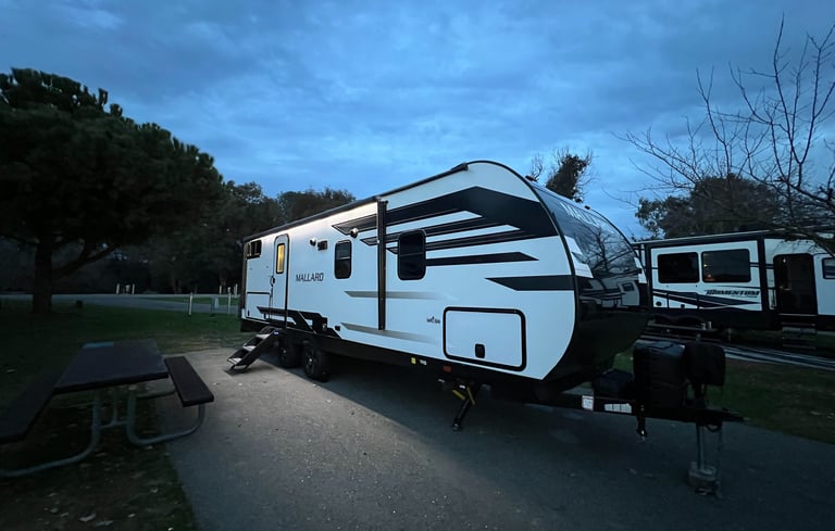 heartland mallart travel trailer at dusk