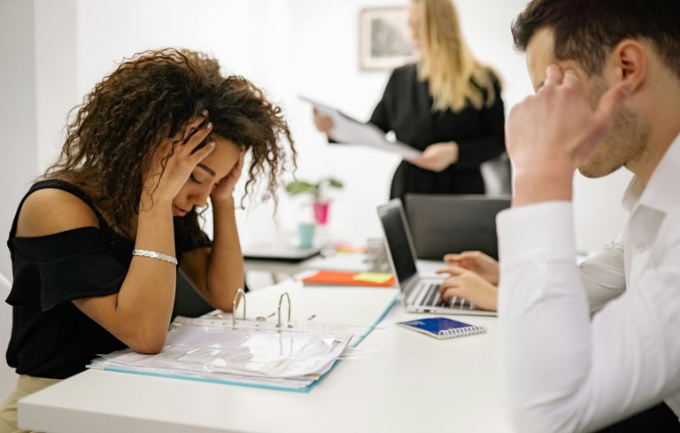 A team sufering under high pressure due to rising standards