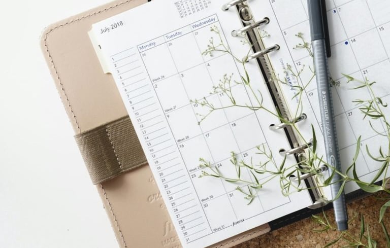 notebook with pen
