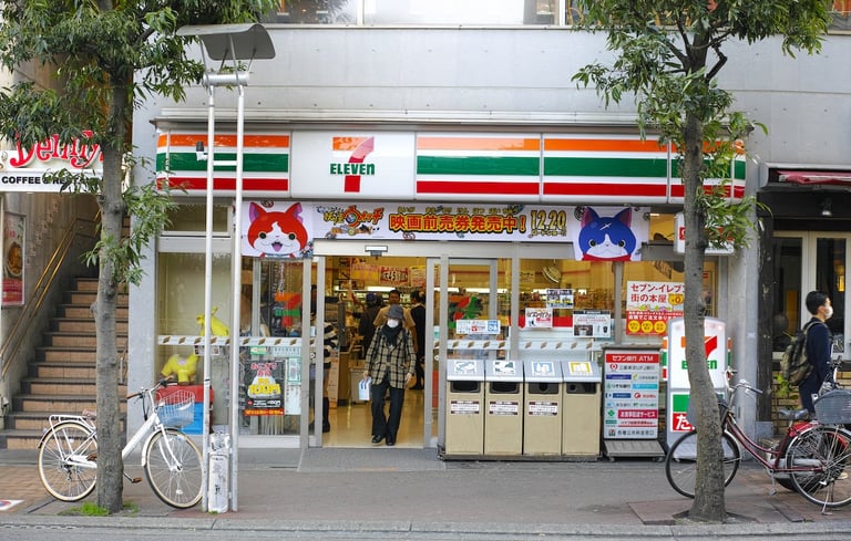a store front of a store with a bicycle parked in front of it