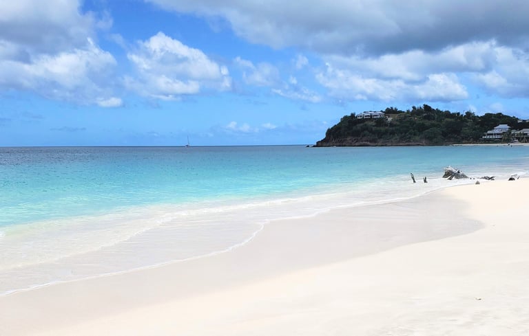 Ffryes Beach Antigua – empty white sand beach with calm turquoise Caribbean water