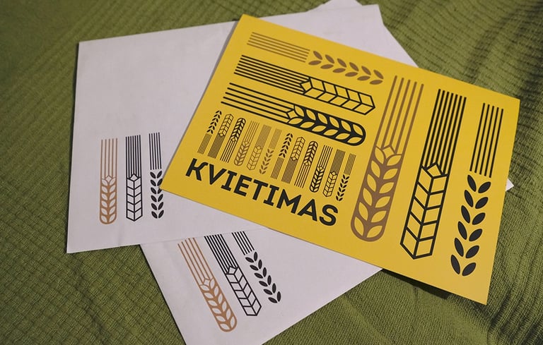 Envelope and postcard for the event. 