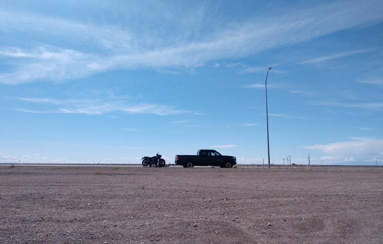 My Tacoma with our bikes on trailer at Bonneville Salt Flats in Utah on our way to Lake Tahoe
