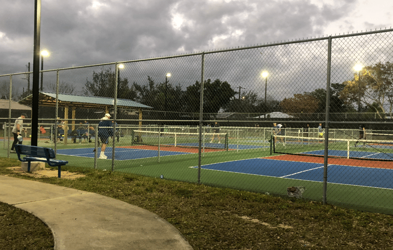 Pickle ball courts with lights in the evening