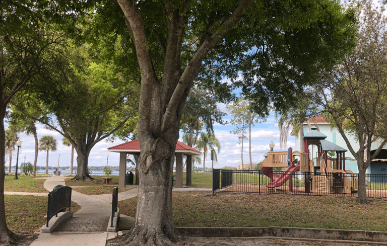 A park by Lake Jackson with trees and a playground