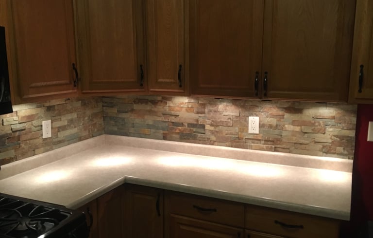 Annick Building Services a Custom kitchen counter top with a stove top