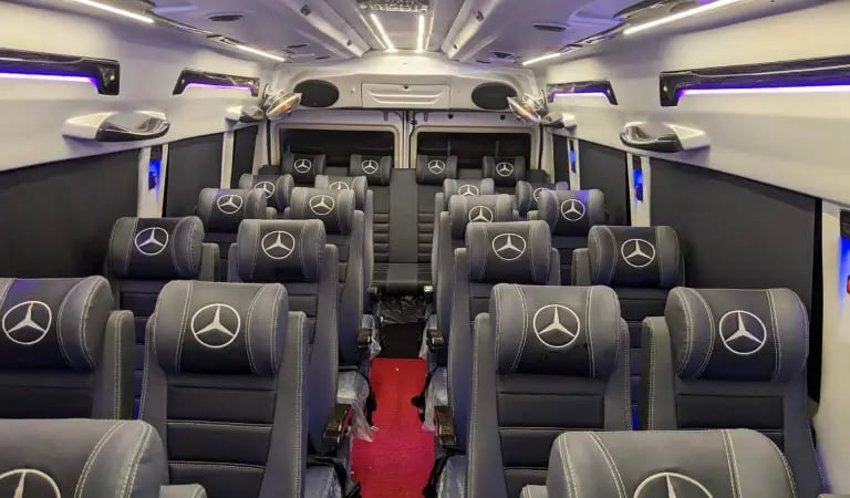 26 seater luxury tempo traveller interior on rent in Delhi for weddings and large group travel
