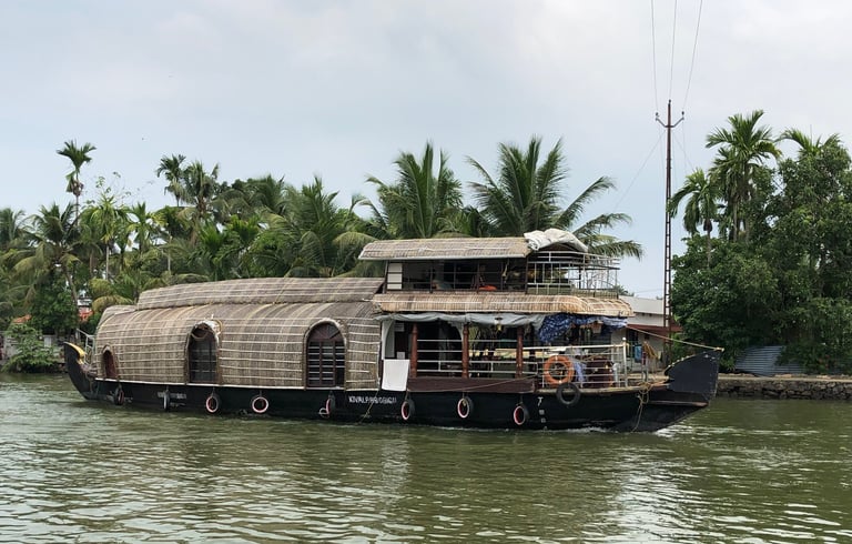 Tracey Billington canoeing on the waterway at Alappuzha, Kerala, India