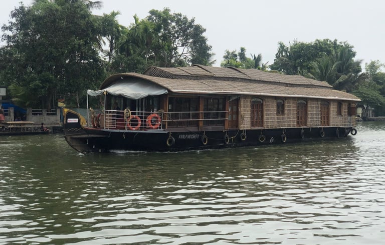 Tracey Billington canoeing on the waterway at Alappuzha, Kerala, India
