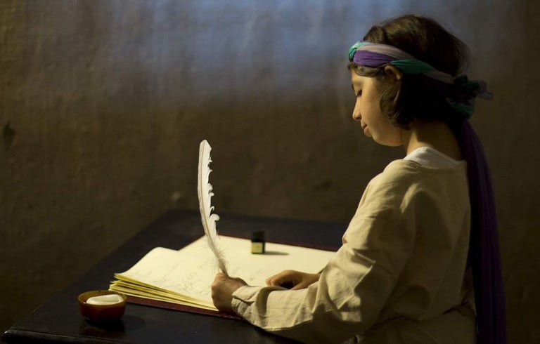 Here we go again. My Feature Articles are coming back. Image: a girl writes with a feather.