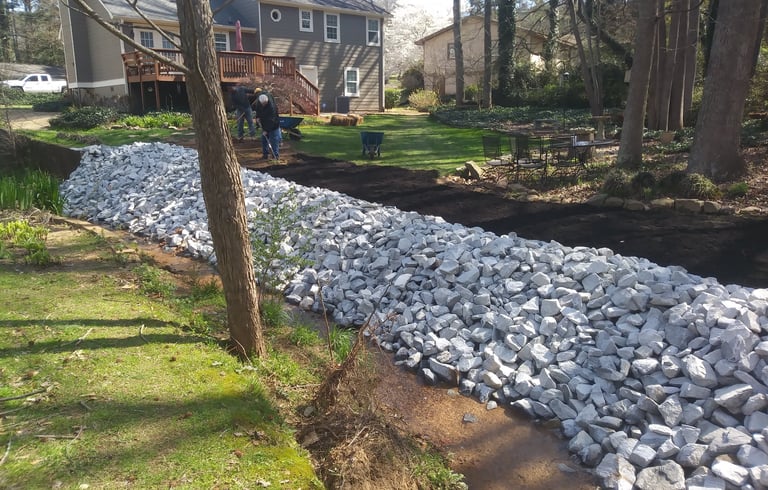 Riprap Installation  — Protect ditches, and slopes from erosion with riprap.