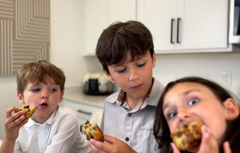 three children eating the best cookies on the planet