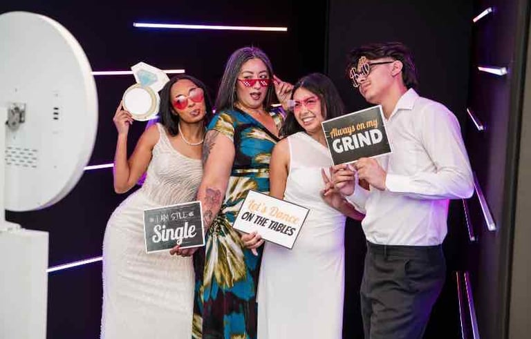 Vogue LED photo booth setup with neon lights at Sweet 16 party