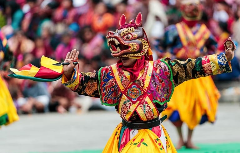 Dancer_potraying_meaningful_hand_gestures_during_annual_religious_masked_dance_festival_in_Thimphu