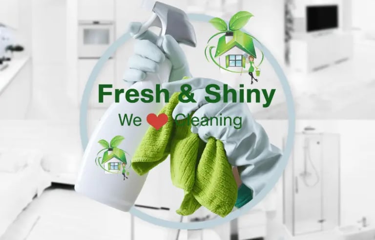 a person cleaning a kitchen with a cleaning cloth
