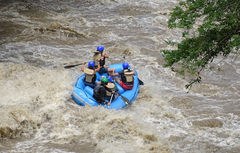 a group of people rafting down the chicamocha canyon in san gil, colombia.