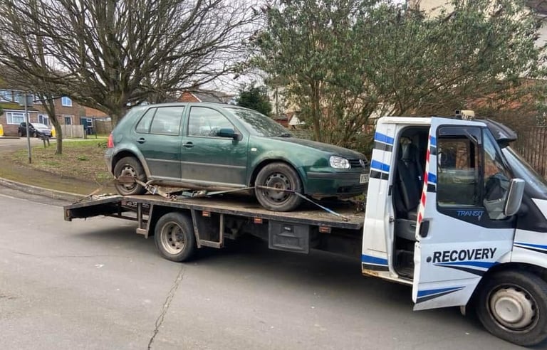 alt="Non-running car being loaded onto scrap truck in Malvern"