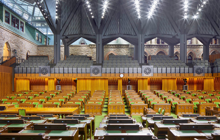 a large room with a lot of wooden tables and chairs