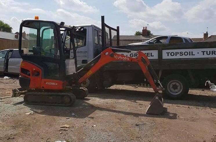 Compact digger on tight access site for excavation across the West Midlands