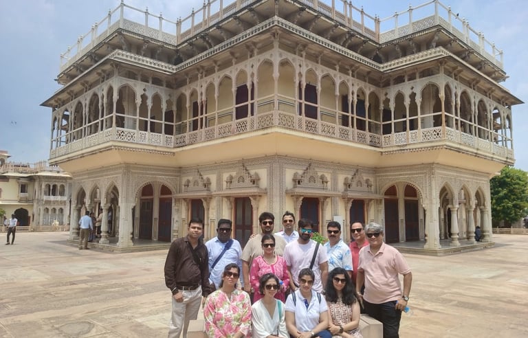a group of people standing in front of a building