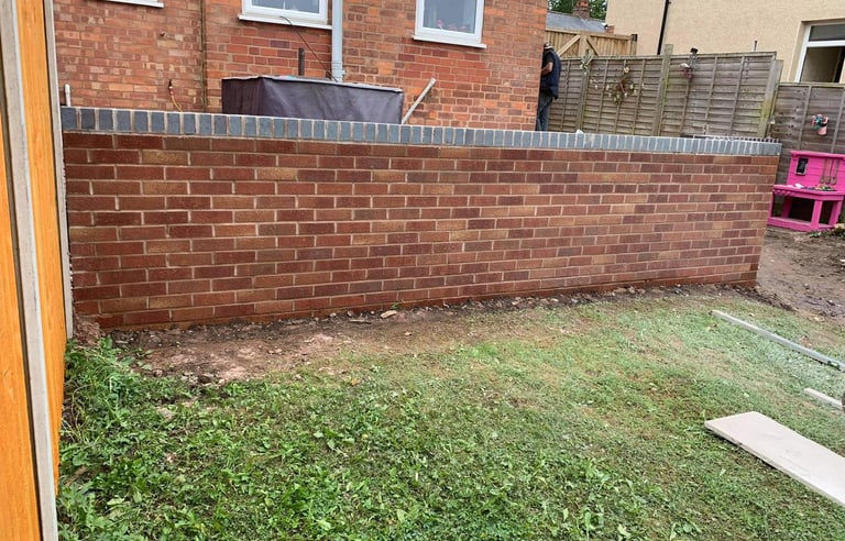 Red brick garden edging in Worcester home