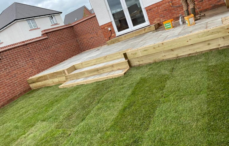 Tiered garden with sleeper retaining walls in Worcester