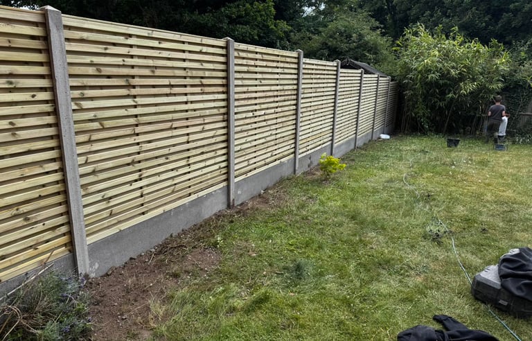 Wooden fence panels and concrete posts in Worcester