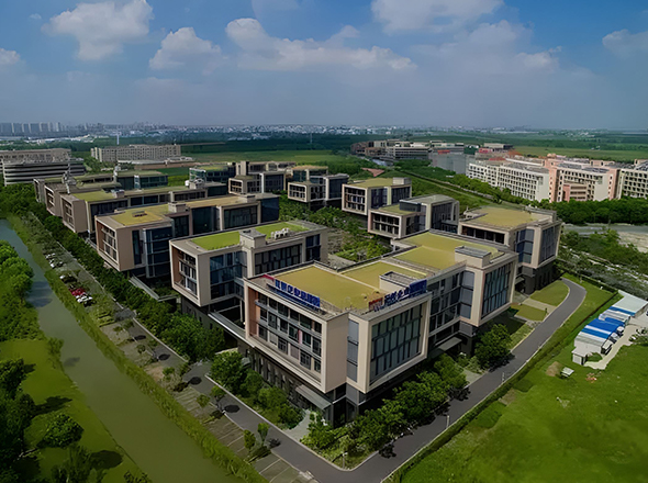 a large building with a green roof and a green roof