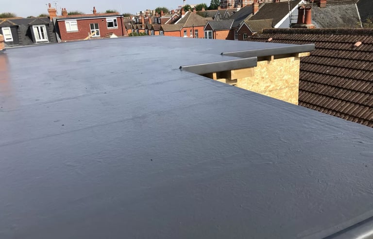 Flat roof dormer loft extension being completed on Brighton house.