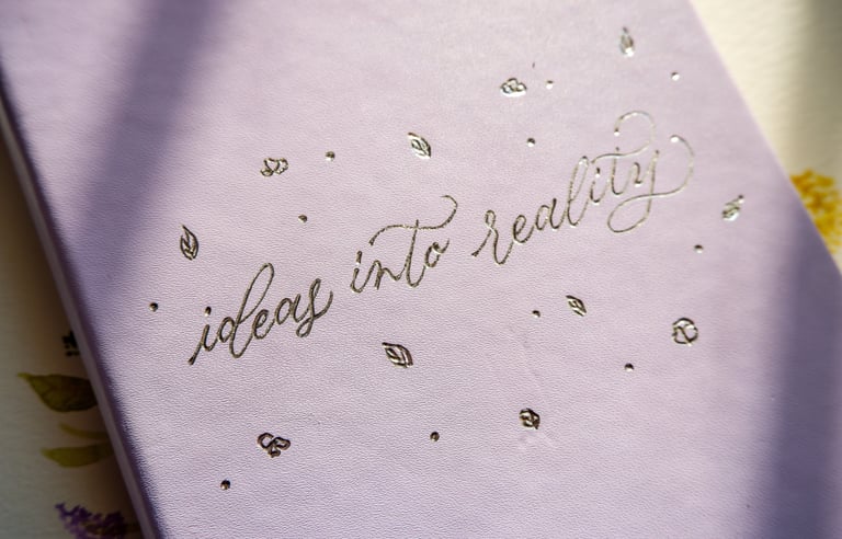 Hot foiling personalization on leather journal by NYC calligrapher Handwritten by Belle.