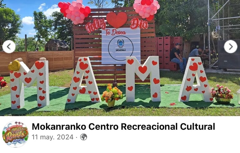 Large white MAMA letters with red hearts at Mokanranko Centro Recreacional for Mother's Day.