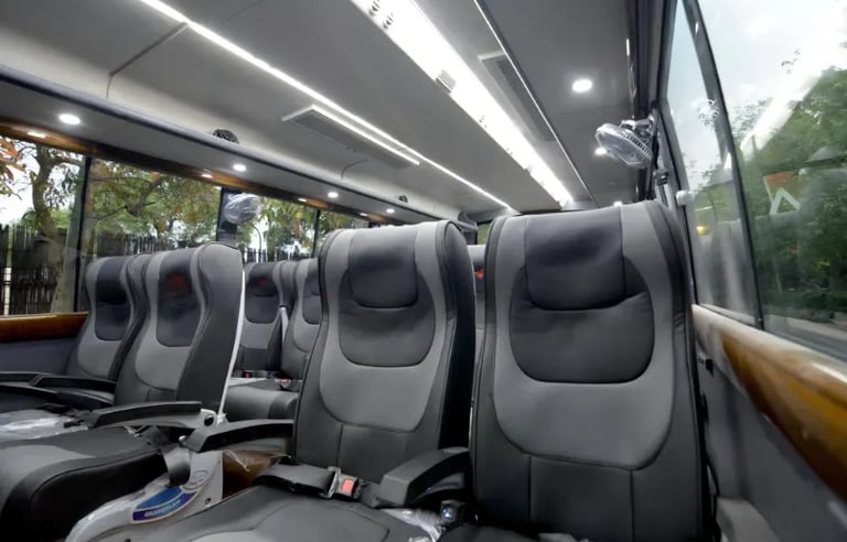 29 seater luxury bus interior for comfortable city travel in Delhi