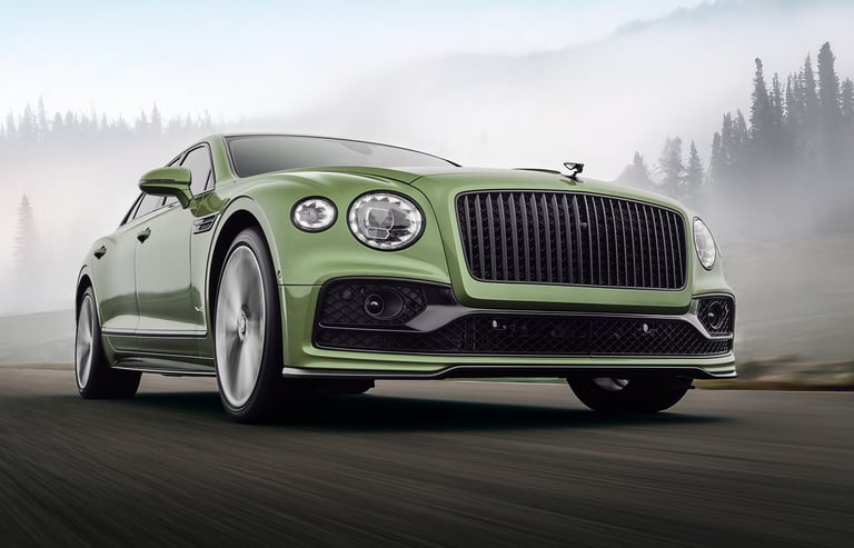 a green bentley rolling shot